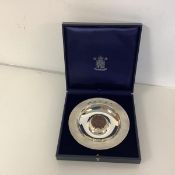 Royal Mint: a Britannia silver "coin" dish, by Christopher Nigel Lawrence, London 1997, inset to the