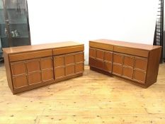 A pair of 1960s teak cabinets by Mackintosh of Kirkcaldy, each rectangular top above a pair of