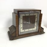 A 1930s/40s Art Deco style mantel clock, the square dial with roman numerals, on bun feet (h.23cm