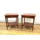 A pair of Stag lamp tables, the rectangular tops with moulded edges over a single frieze drawer,