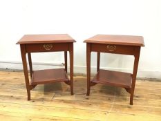 A pair of Stag lamp tables, the rectangular tops with moulded edges over a single frieze drawer,