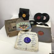 A collection of vinyl records including Scottish Stars Spin on Parlophone, the Beatles, Magical