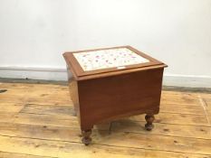 A Victorian mahogany commode, the hinged rectangular top with padded seat enclosing a hinged lid and