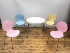 A child's dining set, by Galvano Technica, Italy to include a circular topped dining table, and four