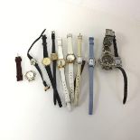 A collection of watches including a Tag Heuer style gentleman's watch, a lady's Hot Diamonds