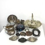 An assortment of Epns including a milk jug, sugar bowl, swing handled basket, mugs etc. (a lot)