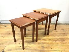 A set of three teak graduated tables by Stag, each with rectangular top and moulded edge, raised