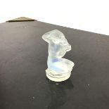 A Lalique figurine of a Kneeling Woman with Flowers, etched Lalique, France to side of base (8cm x