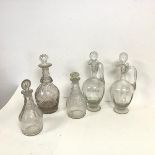 A collection of glass decanters and claret jugs (claret jugs: h.30cm x d.11cm) (5)