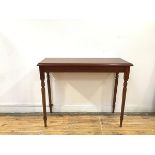 A mahogany side table in the George III style, the rectangular top with moulded edge, raised on