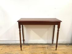 A mahogany side table in the George III style, the rectangular top with moulded edge, raised on