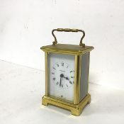 A French three glass carriage clock, the dial with roman numerals, marked Bayerd, the hinged door to