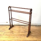 A 19thc towel rail, the five rods on arched topped supports with barley twists (84cm x 78cm x 30cm)