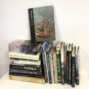 An assortment of books including The World of van Gogh, Collins Encyclopedia of Scotland, Alistair