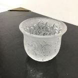 A Lalique pot, the flared lip above foliate decoration, etched Lalique, France to base ((7cm x 9cm)