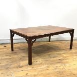 A modern mahogany coffee table of Georgian inspiration, the rectangular top with crossbanded