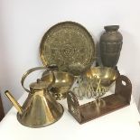 A collection of brassware including kettle, footed bowls, a camel, a tray (d.43cm), a vase with