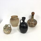 A mixed lot including a glass reproduction jug depicting a Greek Battle, inscribed to base,