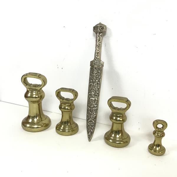 A highly decorated metal dagger with classical motifs to handle, blade and sheath (l.28cm x 3cm at