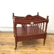 A reproduction mahogany canterbury, the rectangular frame with circular finials to each corner