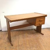 A modern oak desk, the rectangular top with raised sides above a bank of two drawers, raised on a