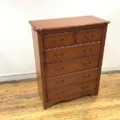 A Silent Night chest of drawers, the rectangular top with curving corners and moulded edge over