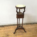 A mahogany wash stand of George II design, early 20thc., with associated ceramic bowl on scroll