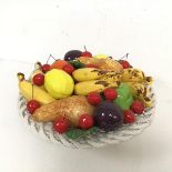 A ceramic bowl of fruit in wicker style ceramic moulded bowl (some repairs) (h.18cm x d.33cm)