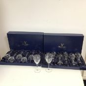 A boxed set of six Gleneagles Crystal wine glasses with etched decoration (h.17cm x 7cm) and another