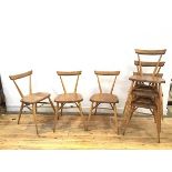 A set of six Ercol stacking chairs, original design by Lucian Ercolani, 1957, the curved top rail on