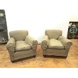 A pair of club armchairs with tweed covering with feather filled deep loose seat cushions, with