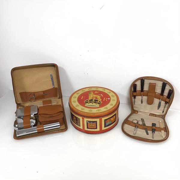 A Peek Frean & Co. Ltd., London circular tin box (h.10cm x d.21cm), a pigskin manicure set and a cow