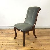 A 19thc rosewood side chair in the French taste, the scroll back with button upholstery above a
