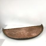 A semi circular copper shelf or table top with raised front piecrust edge (79cm x 37cm)