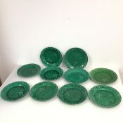 A set of ten Wedgwood leaf on basket majolica plates, all marked Wedgwood to base (d.20cm)