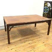A modern mahogany coffee table, with crossbanding and boxwood lining, with pierced spandrels and