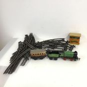 Railway interest: a Hornby engine (a/f) with coal car and passenger car together with a signal