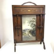 A footed fire screen with central print depicting a Rural Scene, with ledge above and flanked by