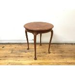 A mahogany circular occasional table, the top with moulded edge over a plain frieze, on cabriole