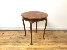 A mahogany circular occasional table, the top with moulded edge over a plain frieze, on cabriole