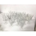 A large assortment of stem glassware including sherry glasses, port glasses, cordial glasses etc.,