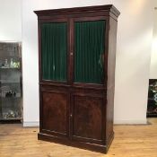 Harewood House interest: a late George III mahogany and ebony lined cabinet, the projecting