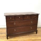 A Stag mahogany chest of drawers, the rectangular top with moulded edge above four short drawers