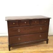 A Stag mahogany chest of drawers, the rectangular top with moulded edge above four short drawers