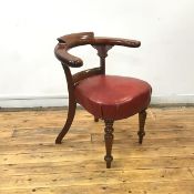A mahogany reading chair, c.1840, the hoop shaped back and horizontal rail above an upholstered