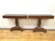 A pair of George IV rosewood side tables, formerly a fold over games table, each with rectangular