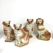 A collection of Staffordshire chimney dogs (losses) (h.33cm x 22cm x 14cm) (4)