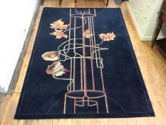 A modern machine made wool carpet with Art Nouveau design, retailed by Martin & Frost, Edinburgh (