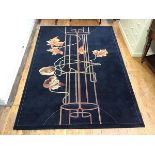A modern machine made wool carpet with Art Nouveau design, retailed by Martin & Frost, Edinburgh (