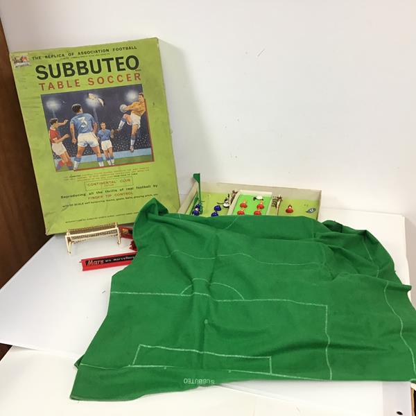 A Subbuteo game including felt pitch, players, nets and original box (8cm x 36cm x 45cm)